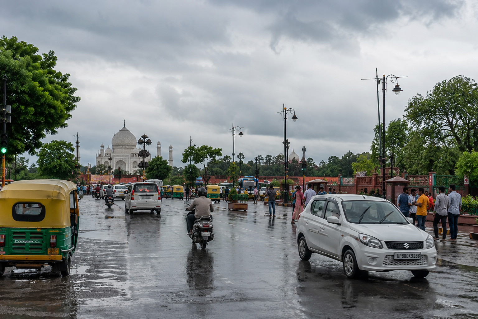 Cloudy weather over Agra with light sunshine and rain-soaked roads as the city witnesses changing monsoon conditions.