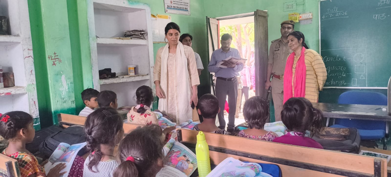 Chief Development Officer Agra inspecting PM SHRI School Mukhbar and PM SHRI School Khedi Adu, reviewing cleanliness, drinking water facilities, student attendance, and school infrastructure in Etmadpur.