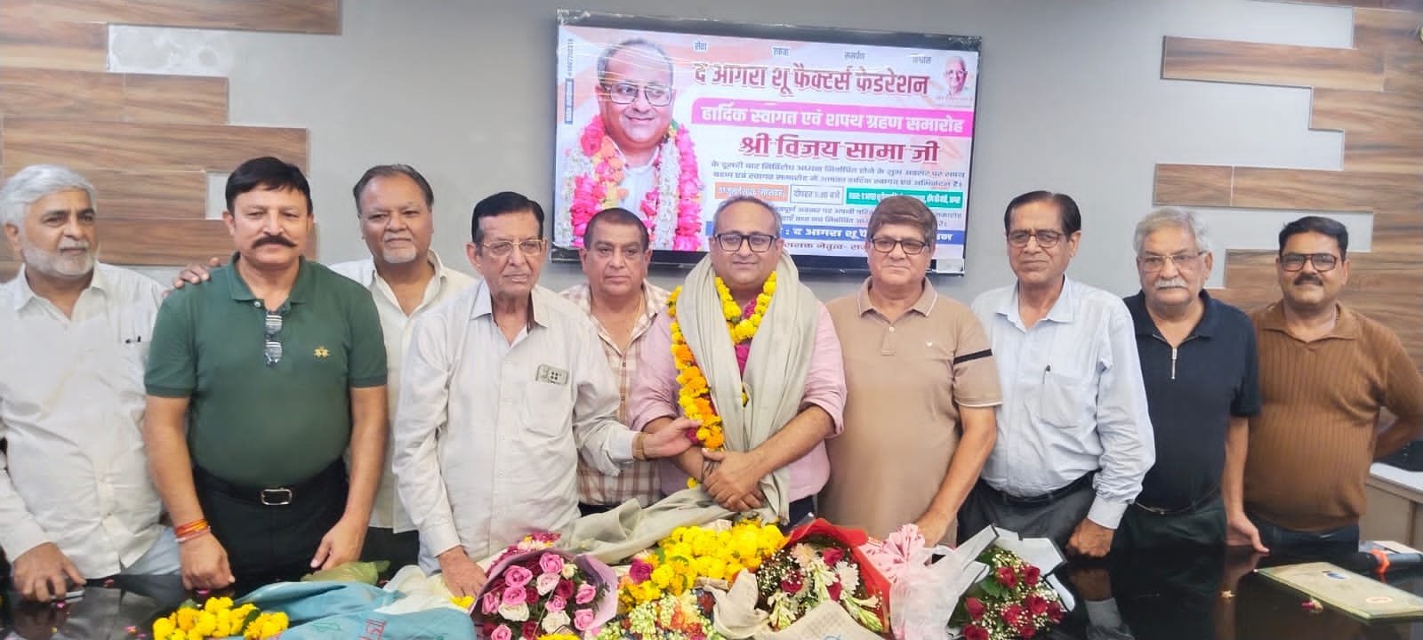 Newly re-elected Agra Shoe Manufacturers Federation President Vijay Sama receives a warm welcome during the oath-taking ceremony at the Federation's newly built auditorium in Hing Ki Mandi, Agra.