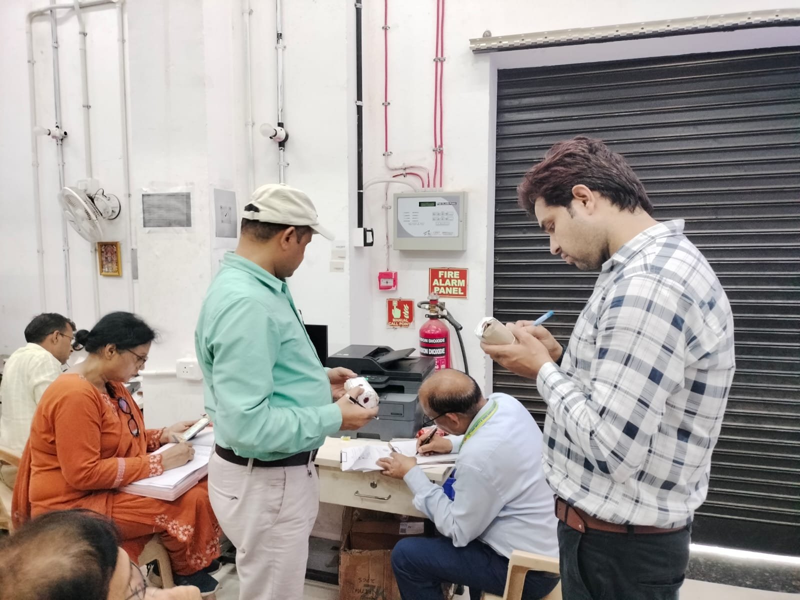 Food Safety and Drug Administration team collecting food samples during a quality inspection in Agra