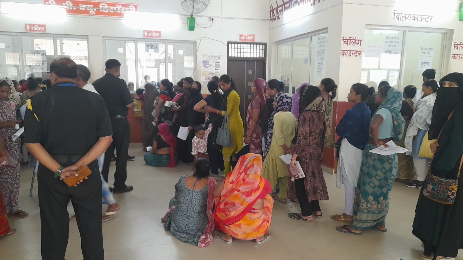Patients waiting in long queues at SN Medical College OPD in Agra as cases of fever, vomiting, and diarrhea increase due to changing weather.