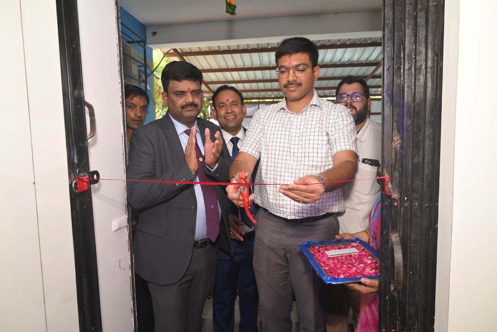 District Magistrate Manish Bansal inaugurates the 98th Canara Bank branch in Kagarol, Agra.