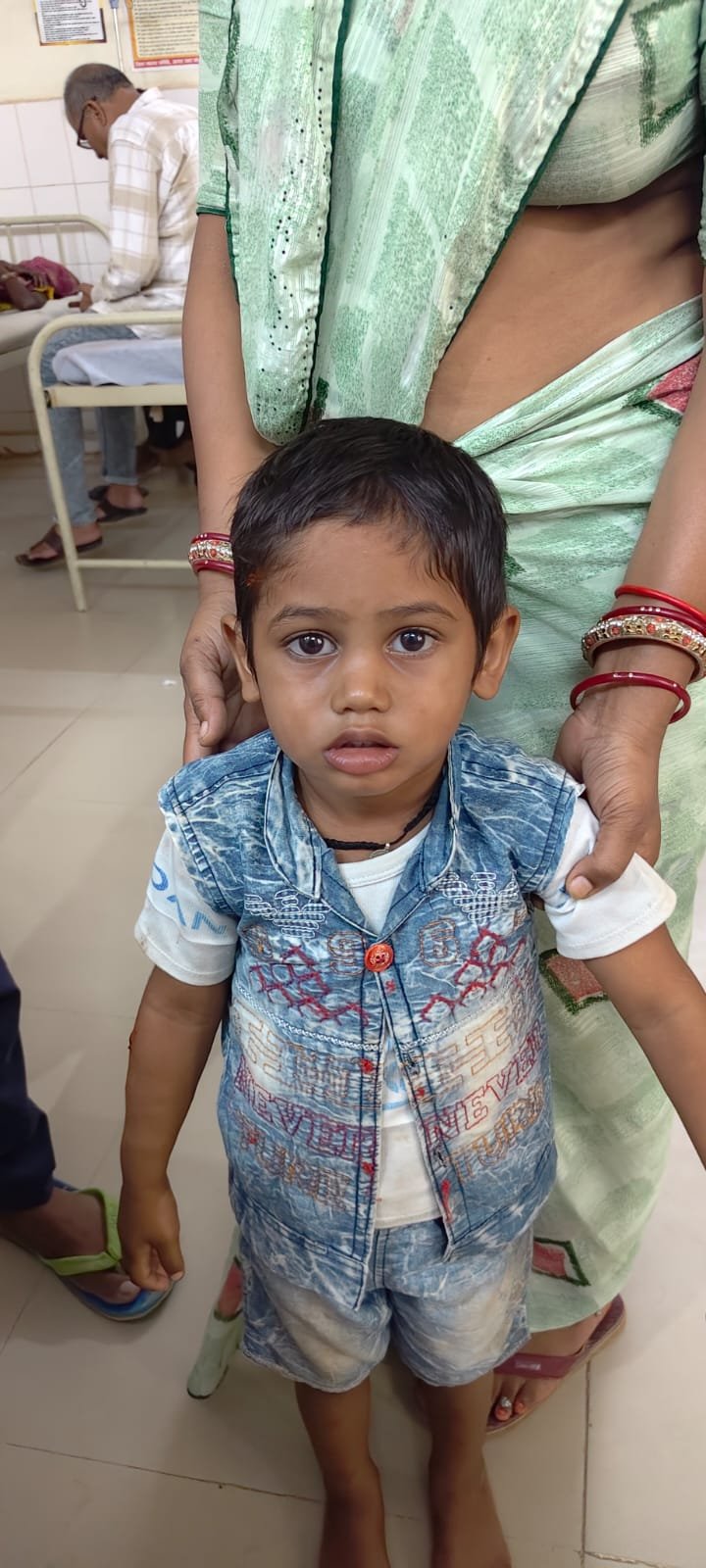 Villagers rescue school children after a stray mad dog attacked students and residents in Puthpura village, Fatehabad, Agra.