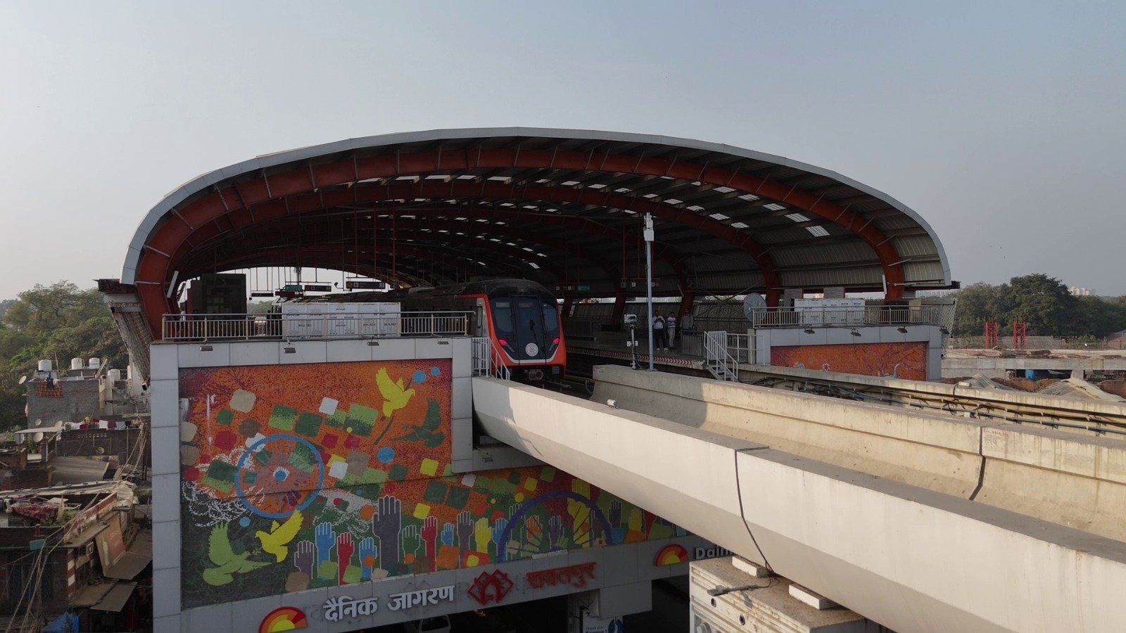 Agra Metro station showcasing commercial branding opportunities, advertising spaces and retail outlets for businesses under the UPMRC tender initiative.