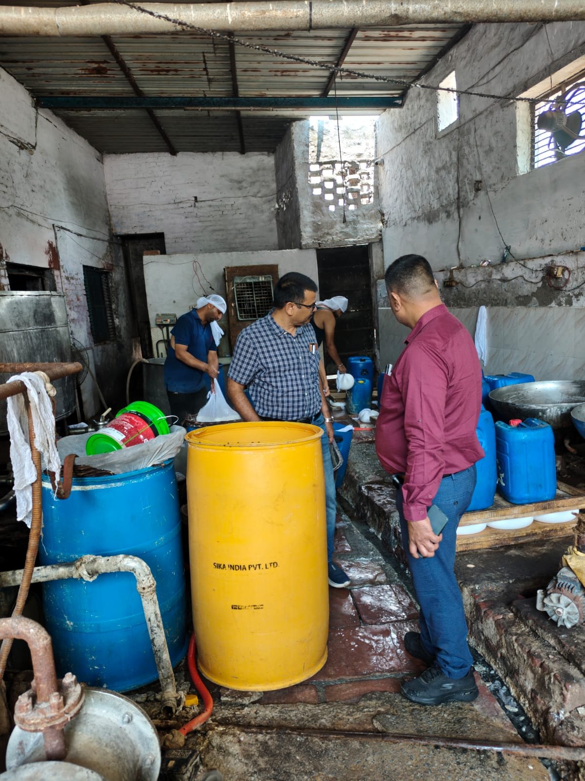 Food Safety Department team collecting legal samples during anti-adulteration campaign in Agra.