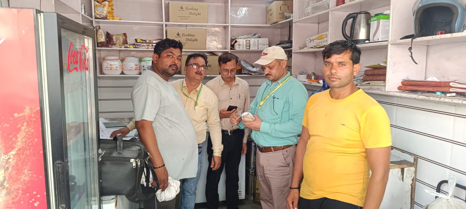 Food safety officials collecting milk, ghee and sweet samples from dairy shops during enforcement drive in Agra