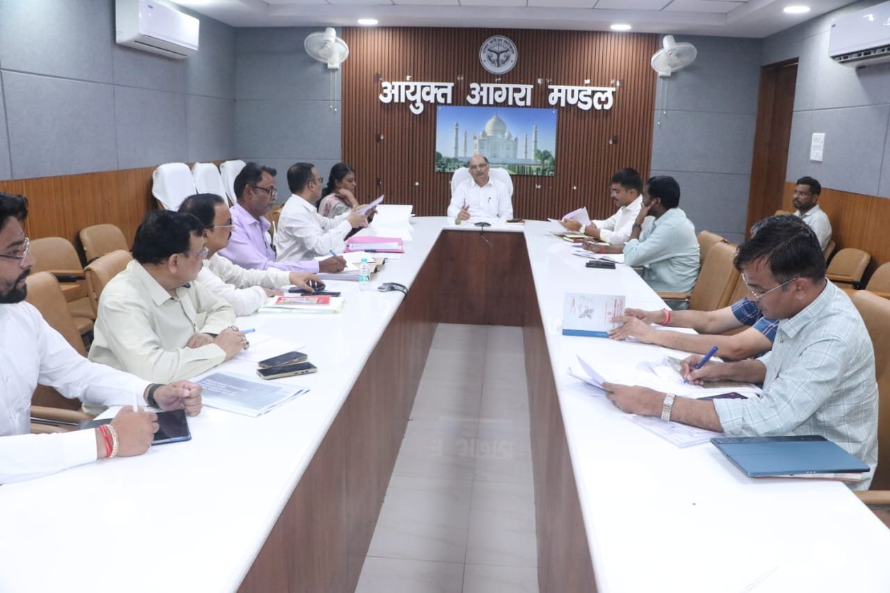Divisional Commissioner reviewing TTZ industrial expansion applications with Agra district officials and Pollution Control Board representatives