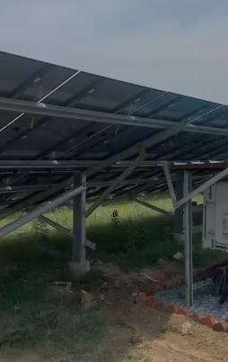 Agra farmer with a 0.7 MW ground-mounted solar power plant installed under the PM-KUSUM Scheme, connected to the electricity grid for clean energy generation.