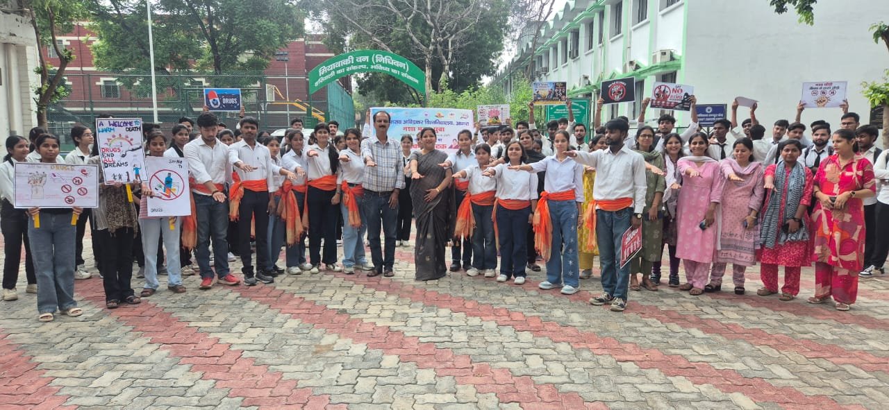 Students participate in Nasha Mukt Bharat awareness program at Dr. Bhimrao Ambedkar University Agra through speech competition, street play and collective pledge.