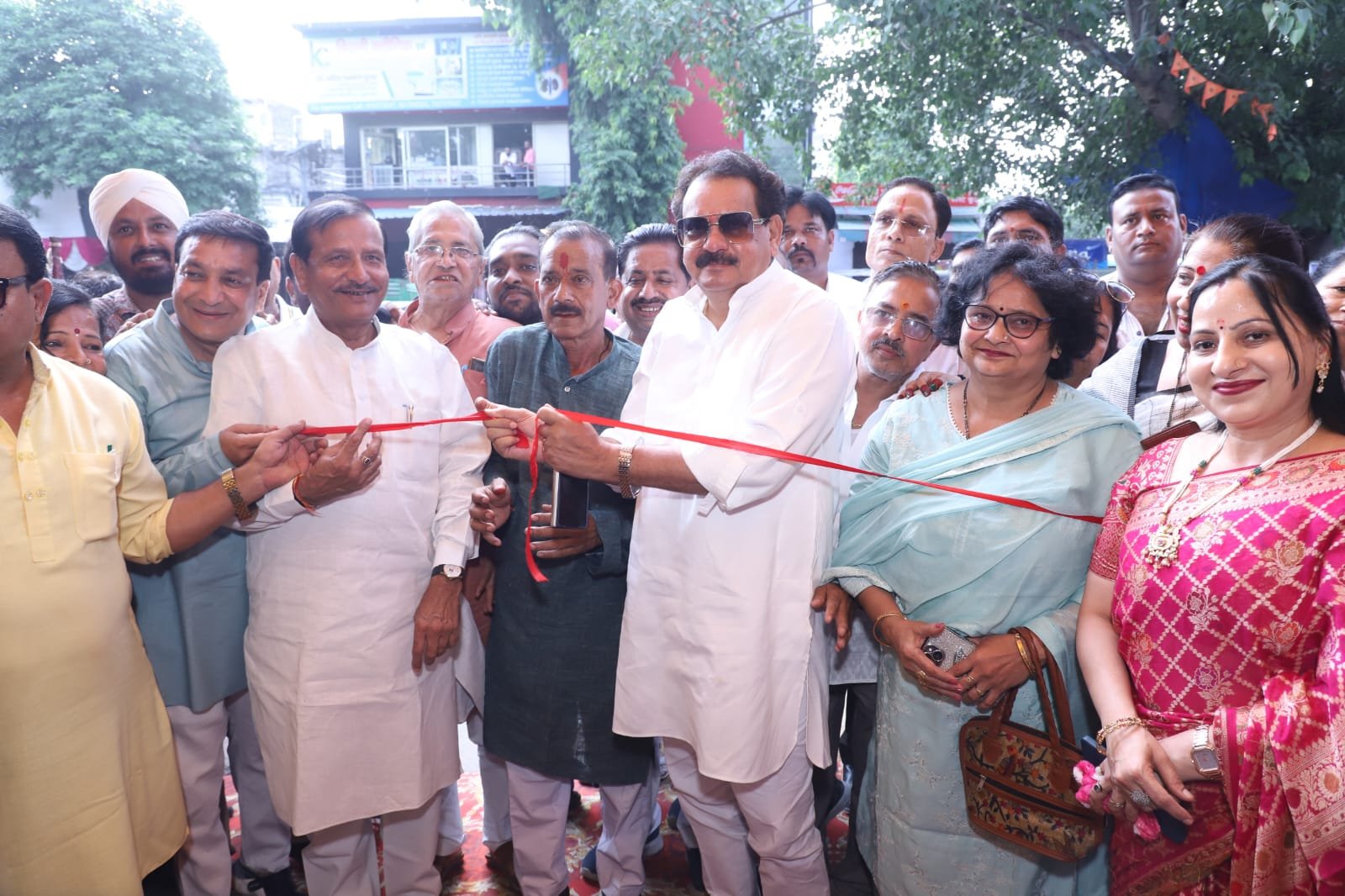 Union Minister SP Singh Baghel and other dignitaries inaugurating Balkeshwar Mahadev Fair 2026 by cutting the ribbon in Agra