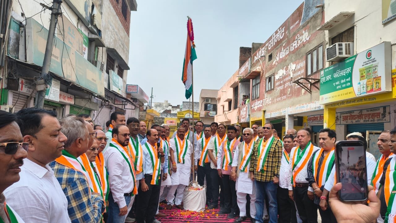 National Chamber Agra office bearers salute the national flag on Independence Day