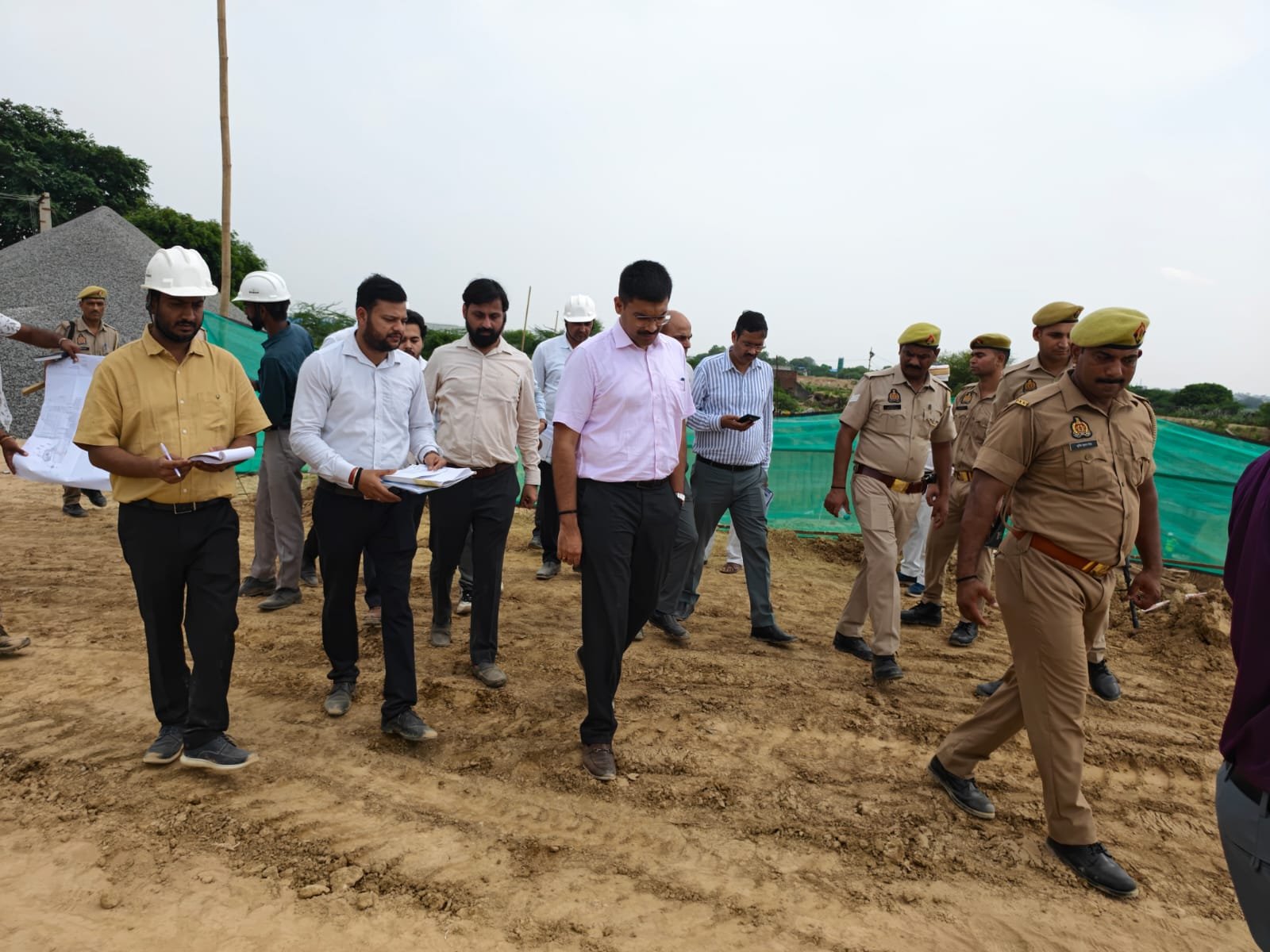 Agra DM Manish Bansal inspecting the under-construction water project at Poiyia Ghat