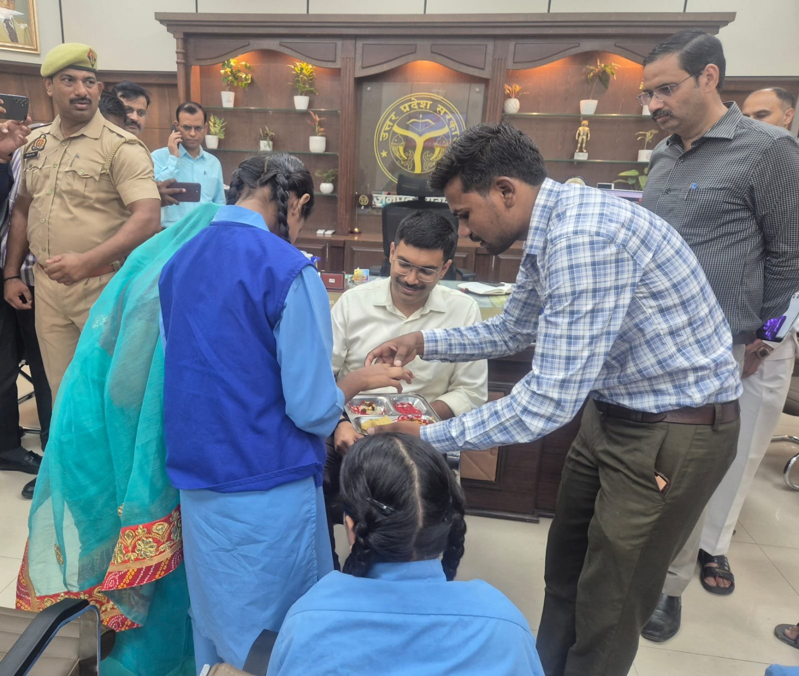 Agra DM Manish Bansal ties Rakhi with visually impaired girls on Raksha Bandhan 2026