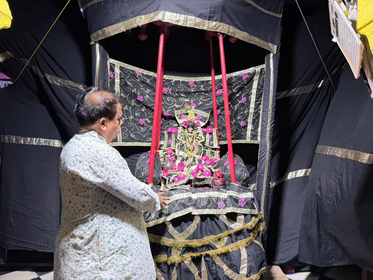 Devotees viewing Kali Ghata Jhanki at Mathuradheesh Temple Agra