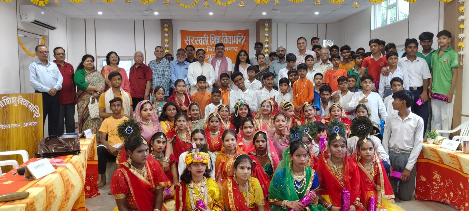 Students participating in Dahi Handi competition at Saraswati Shishu Mandir Agra