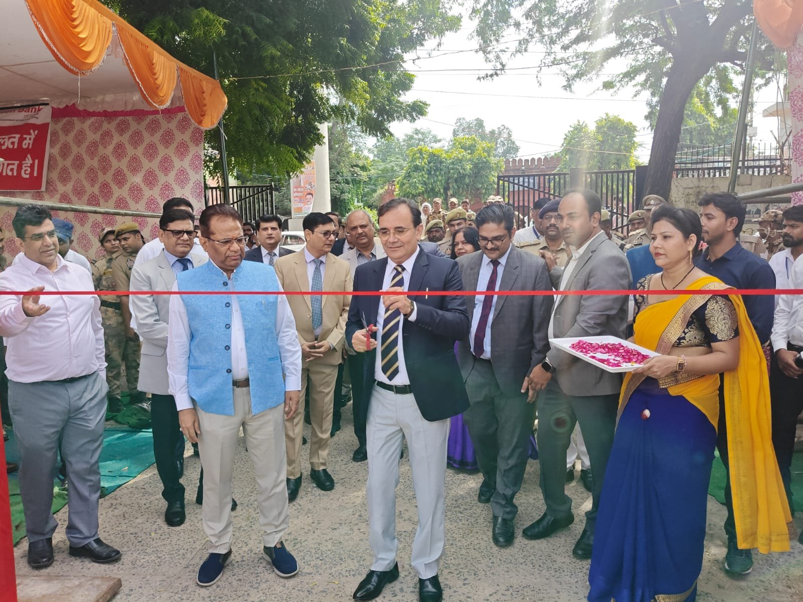 Sanjay Kumar Malik inaugurates National Lok Adalat in Agra by cutting the ribbon