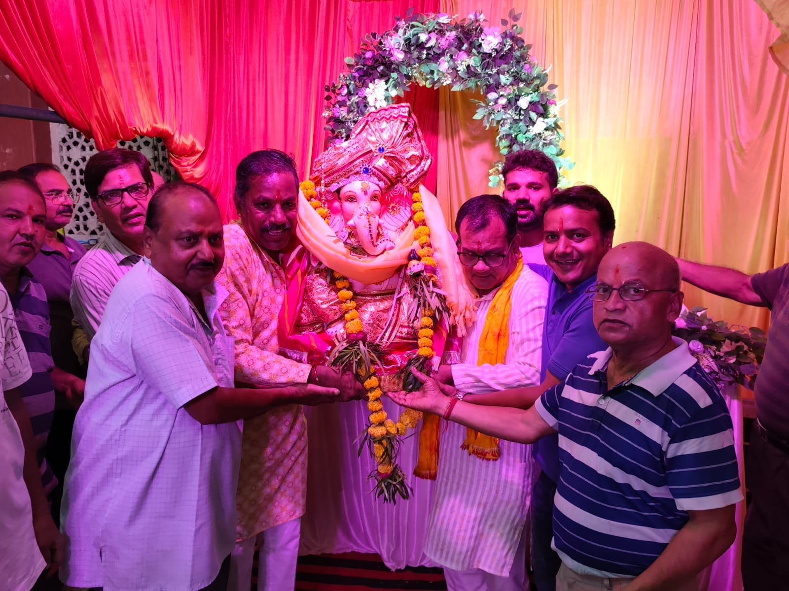 Devotees carrying Ganesh idol for immersion