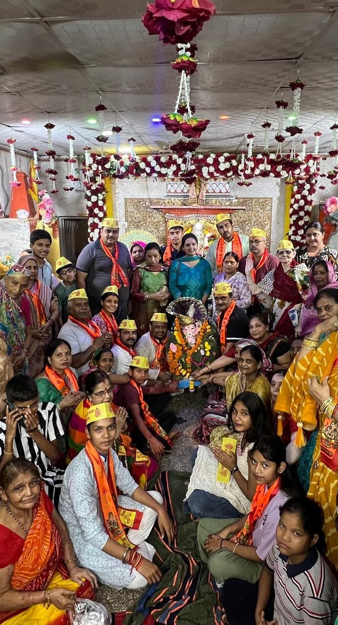 Devotees carrying Siddhivinayak Ganesh idol for immersion at Kailash Ghat