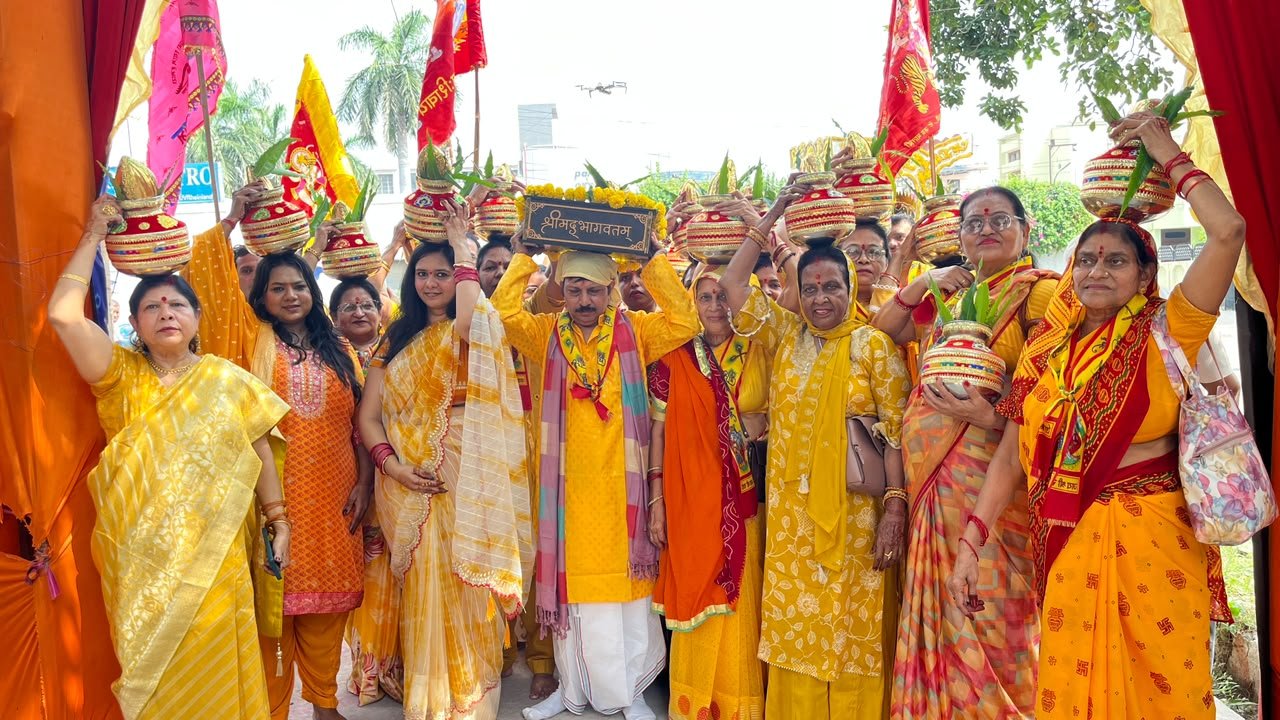 Women carrying kalash during Shrimad Bhagwat Katha Kalash Yatra at Srinath Ji Temple in Agra