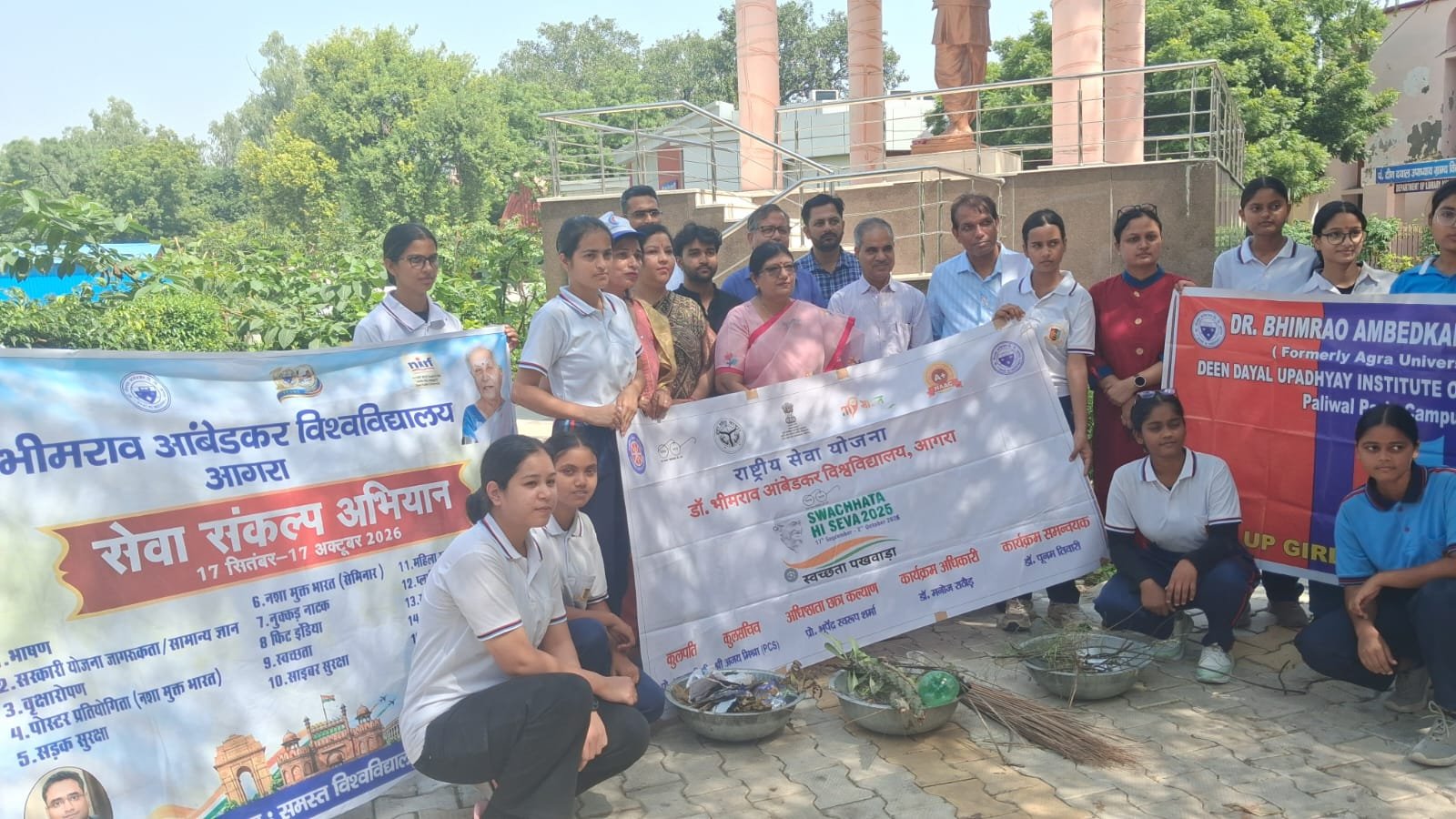 NSS and NCC volunteers participating in a cleanliness drive at DBRAU Agra