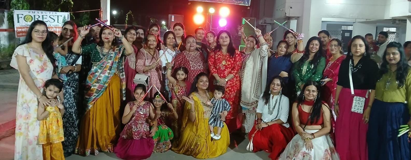 Participants playing dandiya during the Diwali celebration at Maruti Forest Welfare Society in Agra